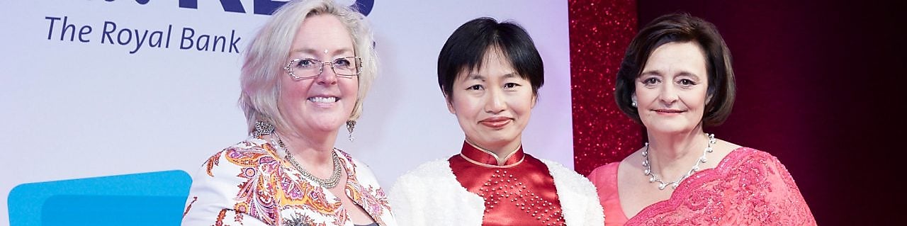 Three women’s are standing at RBS award function.
