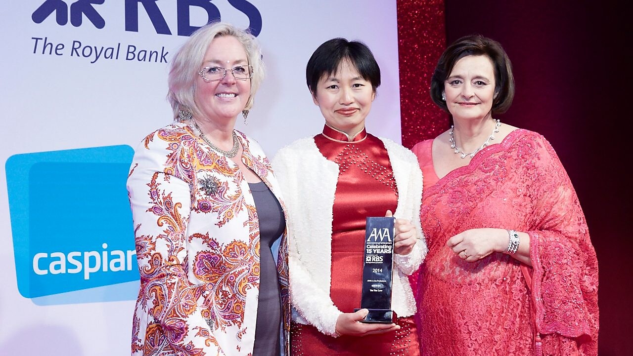 Three women’s are standing at RBS award function.