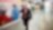 Andy Kneen walking and talking on the phone at a Shell office